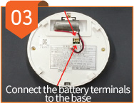 03 - Connect the battery terminals to the base